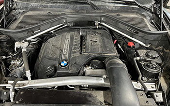 Exterior Services | BMW engine before | Elite Imports & Auto Repair
