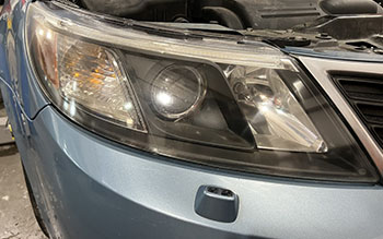 Exterior Services | Saab Headlight After | Elite Imports & Auto Repair